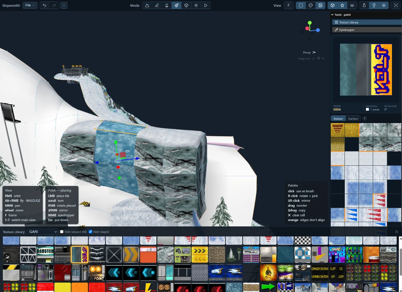 A terrain patch painted with an ice tile, with the paint palette and imported-course Texture Library visible.